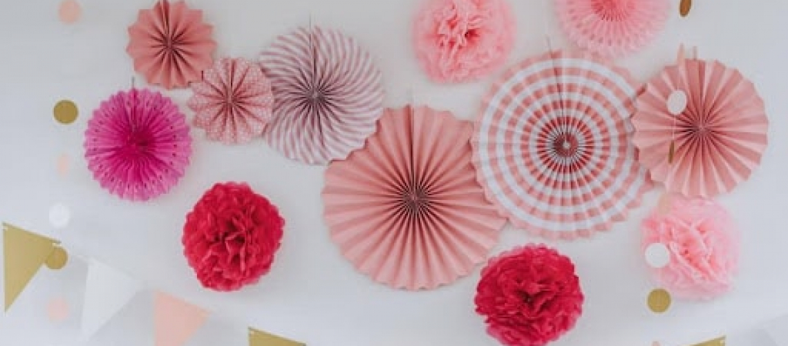 Strike a Pose and Create a Picture-Perfect Moment with a Paper Fan Photo Backdrop