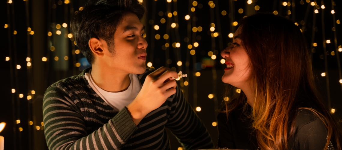 young couple celebrate at night party, romance date and love concept for Valentine's Day
